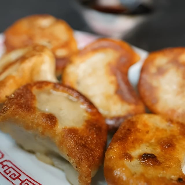 Pan Fried or Steamed Dumplings (6 Pieces).