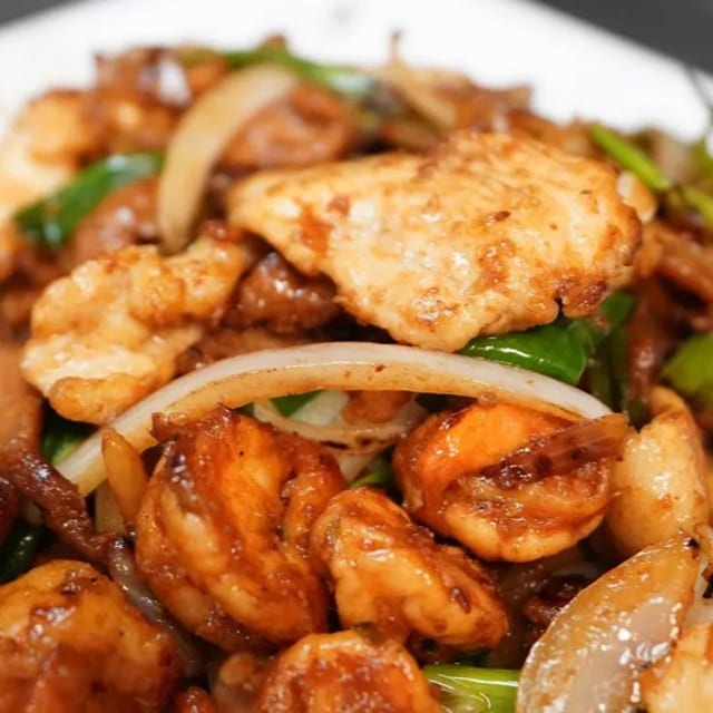 Pork, Chicken & Shrimp Scallion Specialty.